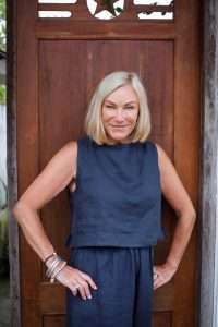 indigo linen top middle-aged woman showing front of sleeveless top
